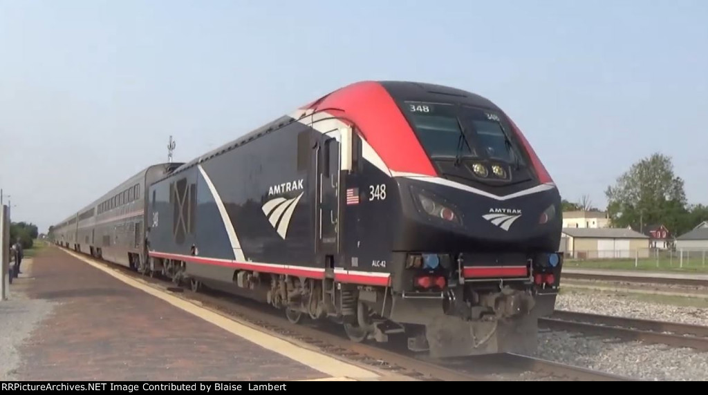 Amtrak 390 with one of the long distant chargers